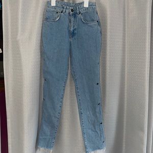 The ragged priest light wash jeans with functional accent buttons up the side